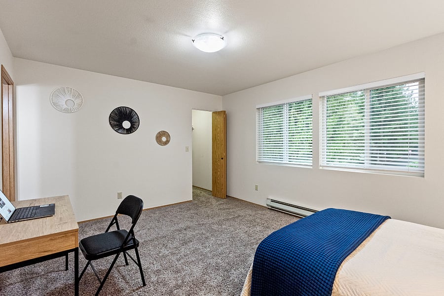 Bedroom has working desk. High speed internet throughout the apartment