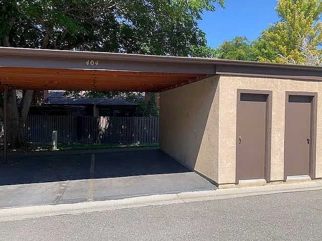2 designated carport spaces and a storage room