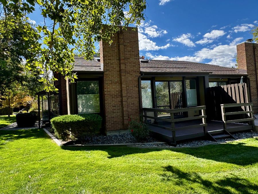 Back Deck accessed through double sliding doors from living area