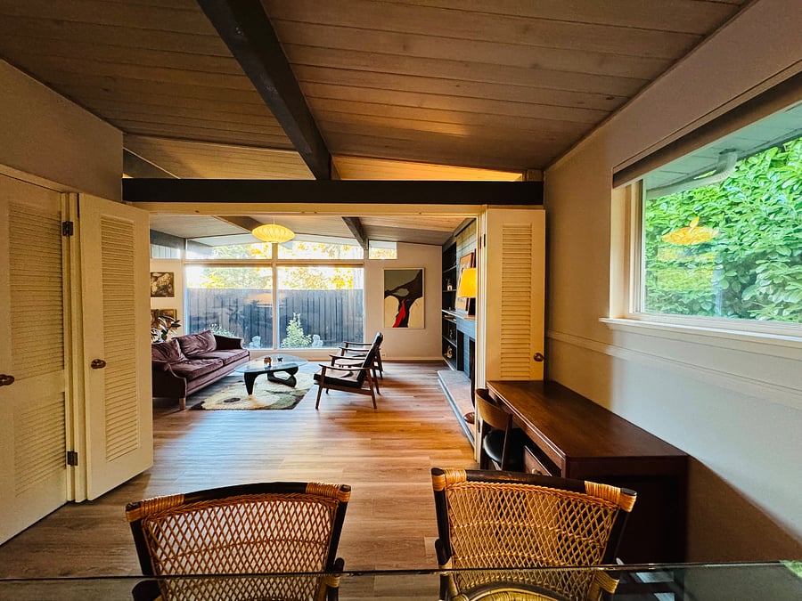 Desk and lounge area. View is from tiki bar looking into living room.