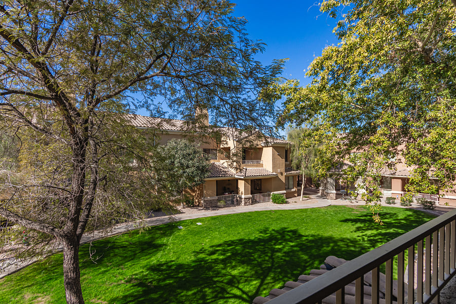 Serene views of greenbelt from private patio