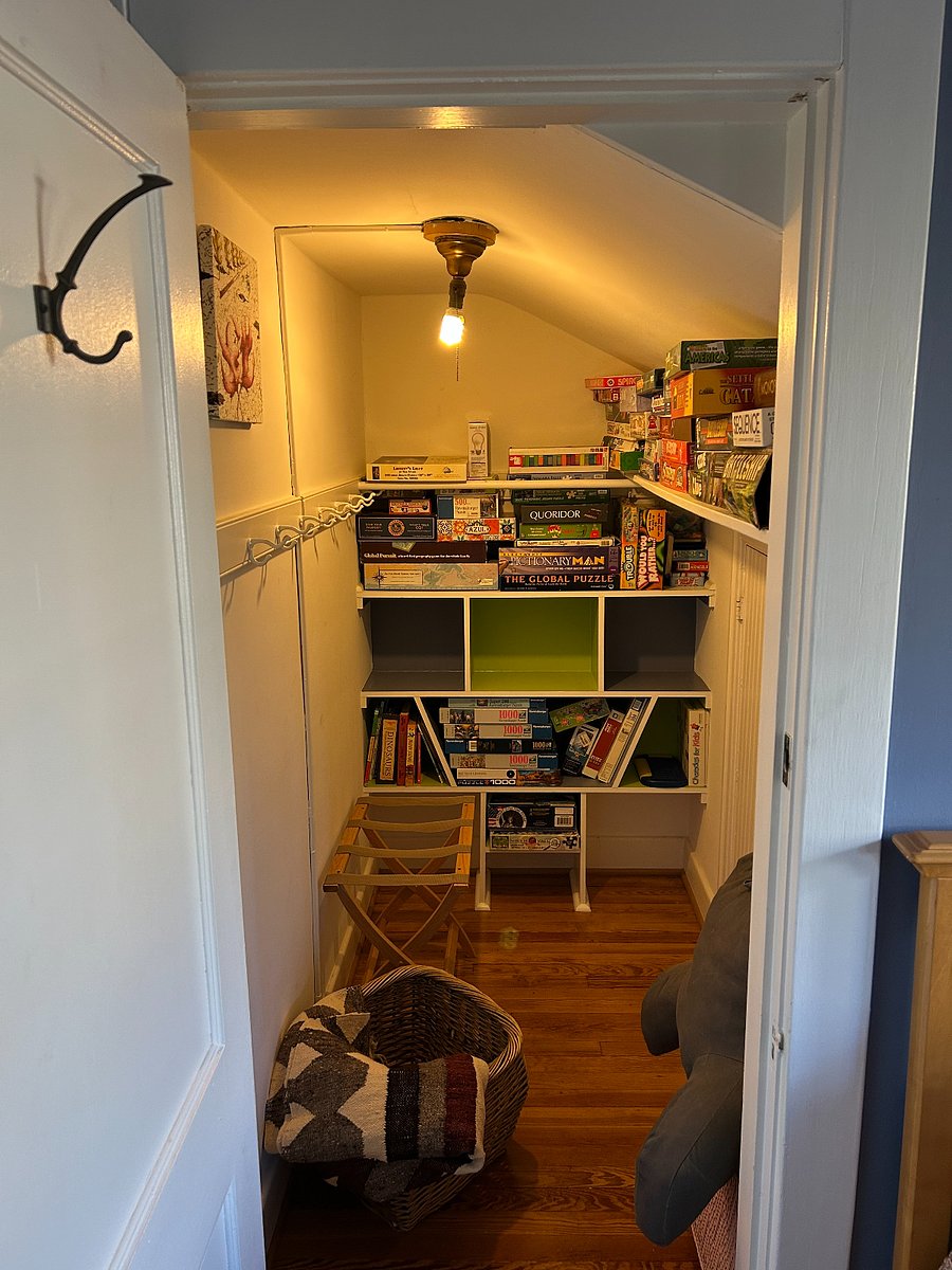 Walk-in closet with access to board games and puzzles.