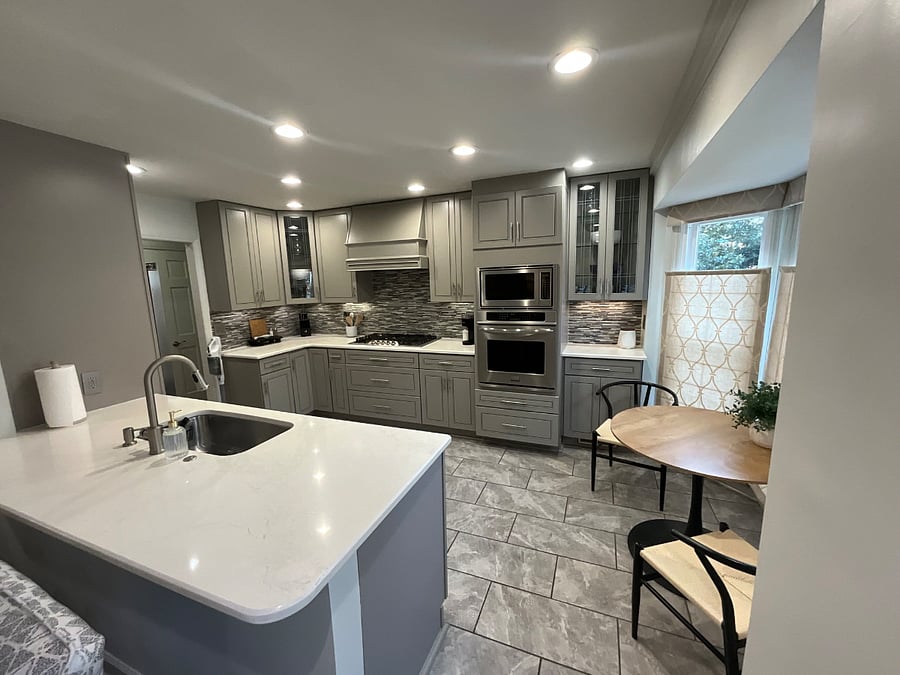 Beautiful Kitchen with granite and tile backsplash 