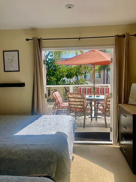 Bedroom #2 opens out to second floor deck.
Two queen beds and smart TV.