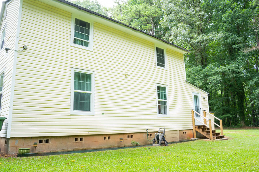 Side of Rental Unit showing upper and lower levels. 2 Bedrooms upstairs