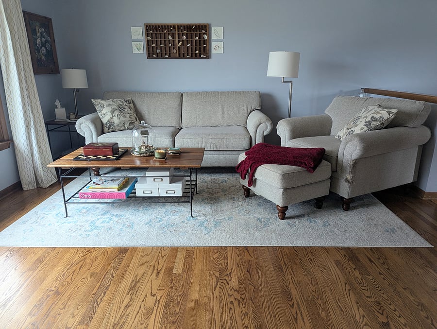 Read a book on this cozy couch or socialize with a game of chess!