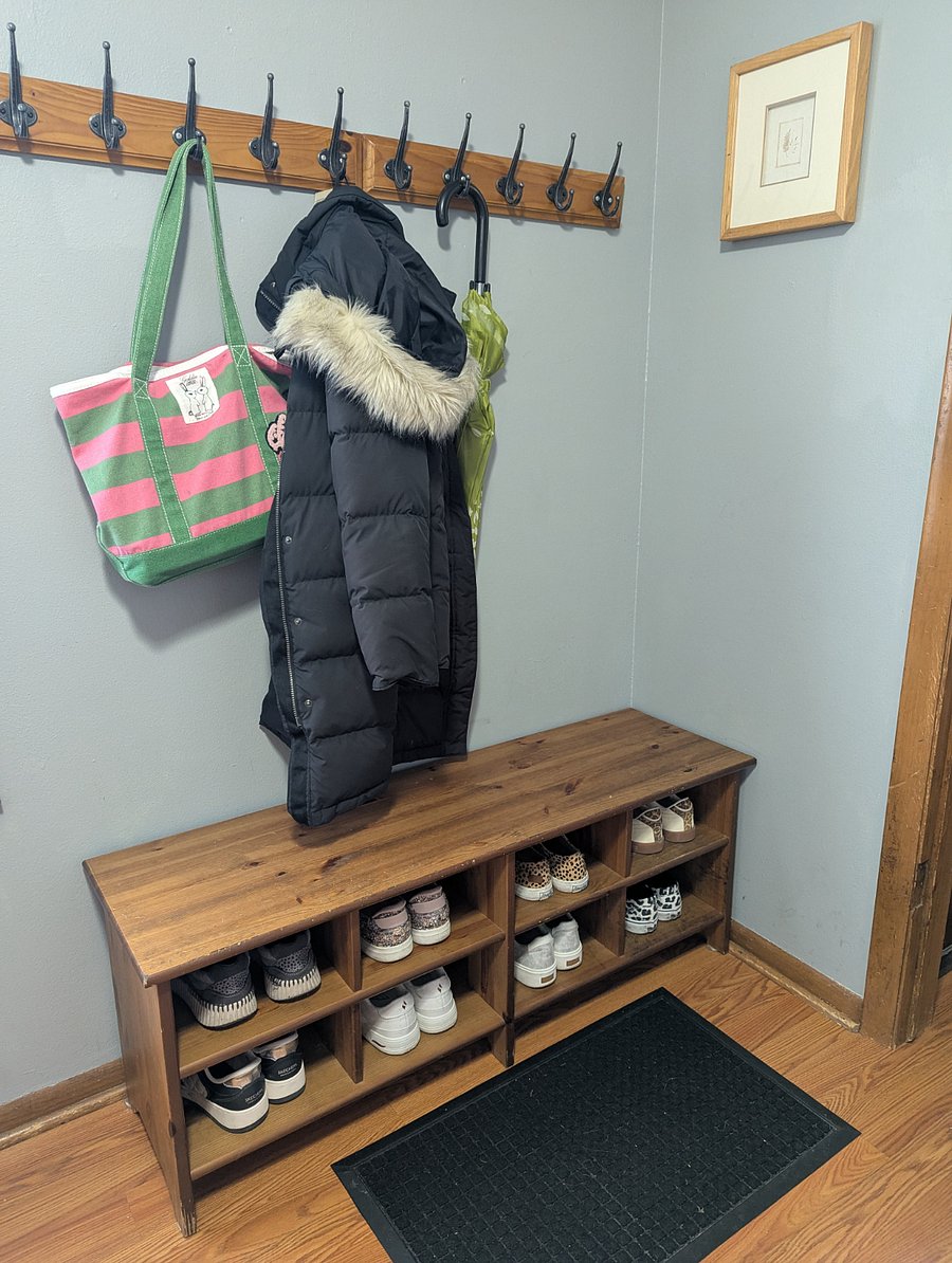 Back entryway where you can drop off your coat and shoes/boots.