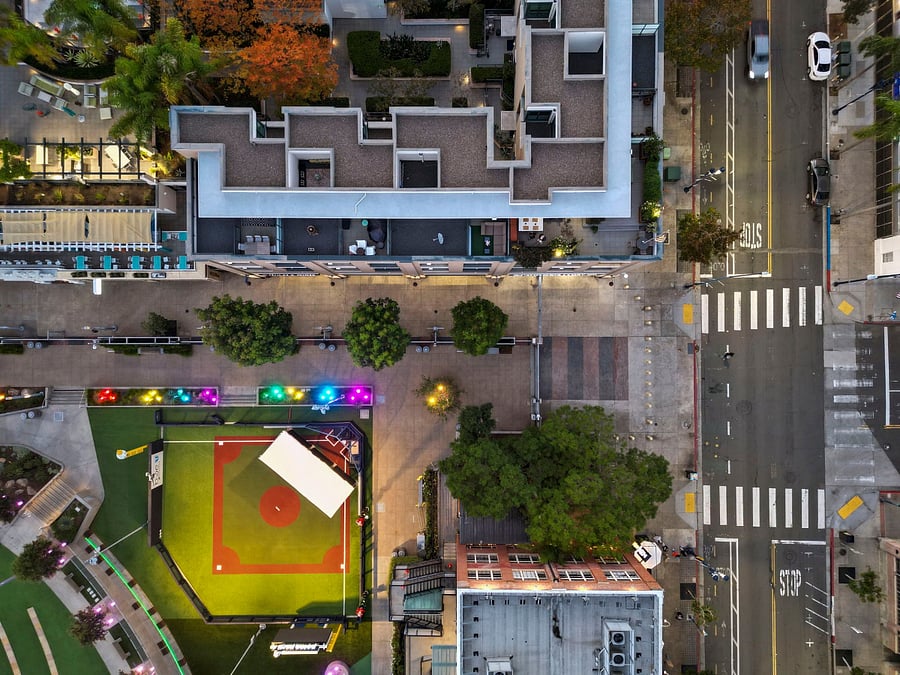 Ariel of the roof deck and proximity / view of Gallagher Square amenities and activities.