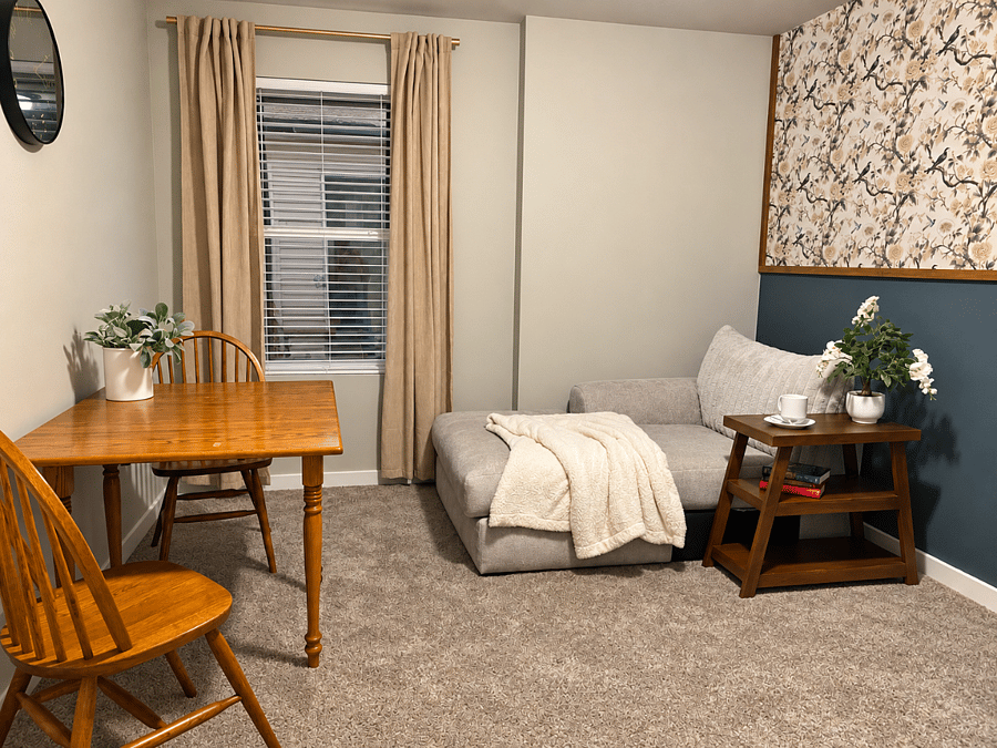 private second room designed as a comfortable living and dining area-perfect for relaxing enjoying a meal ,or using the table as workspace
