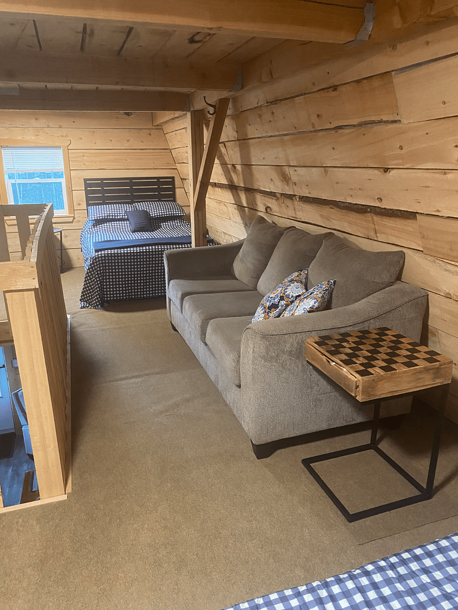 Loft has a couch in addition to 4 full size beds