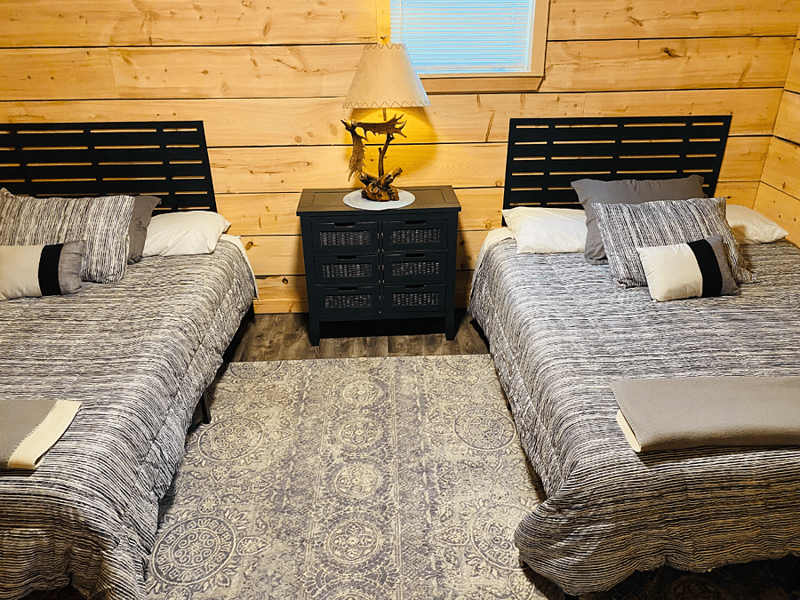 Downstairs bedroom has two Queen beds