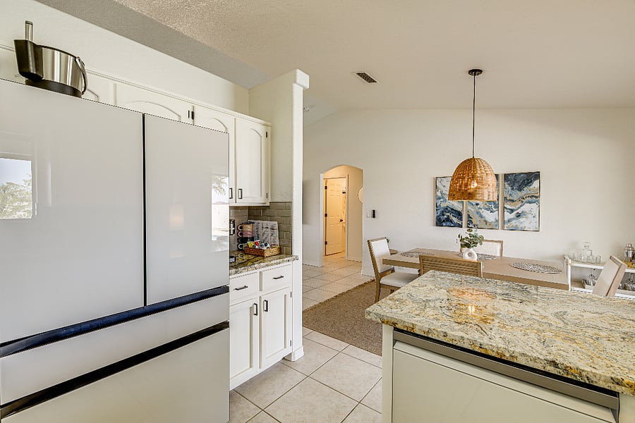 Refrigerator with built-in filtered water station.