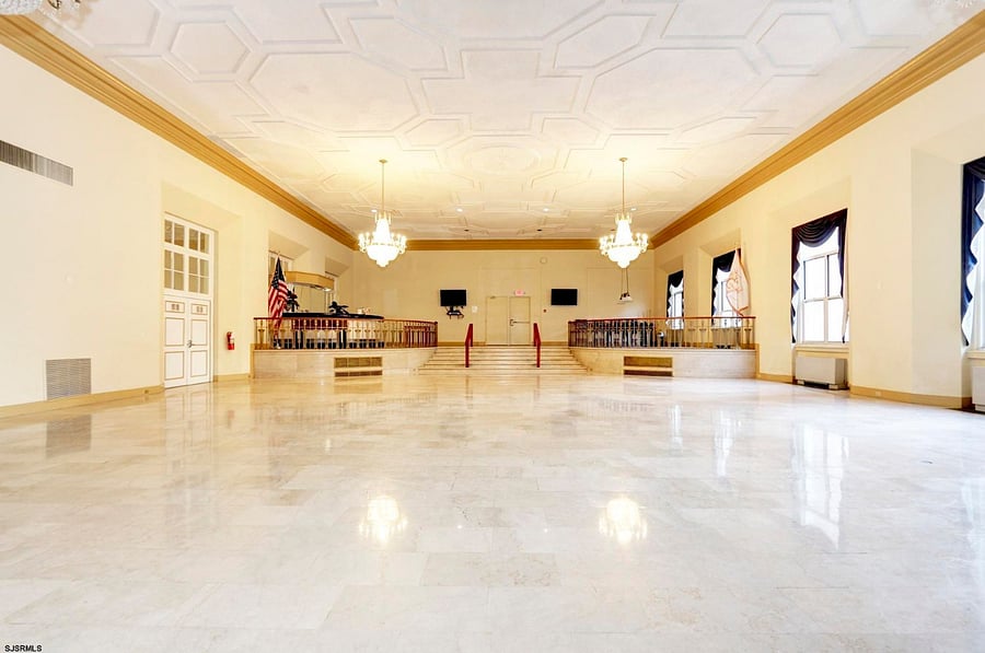 Original grand ballroom with white marble floors.