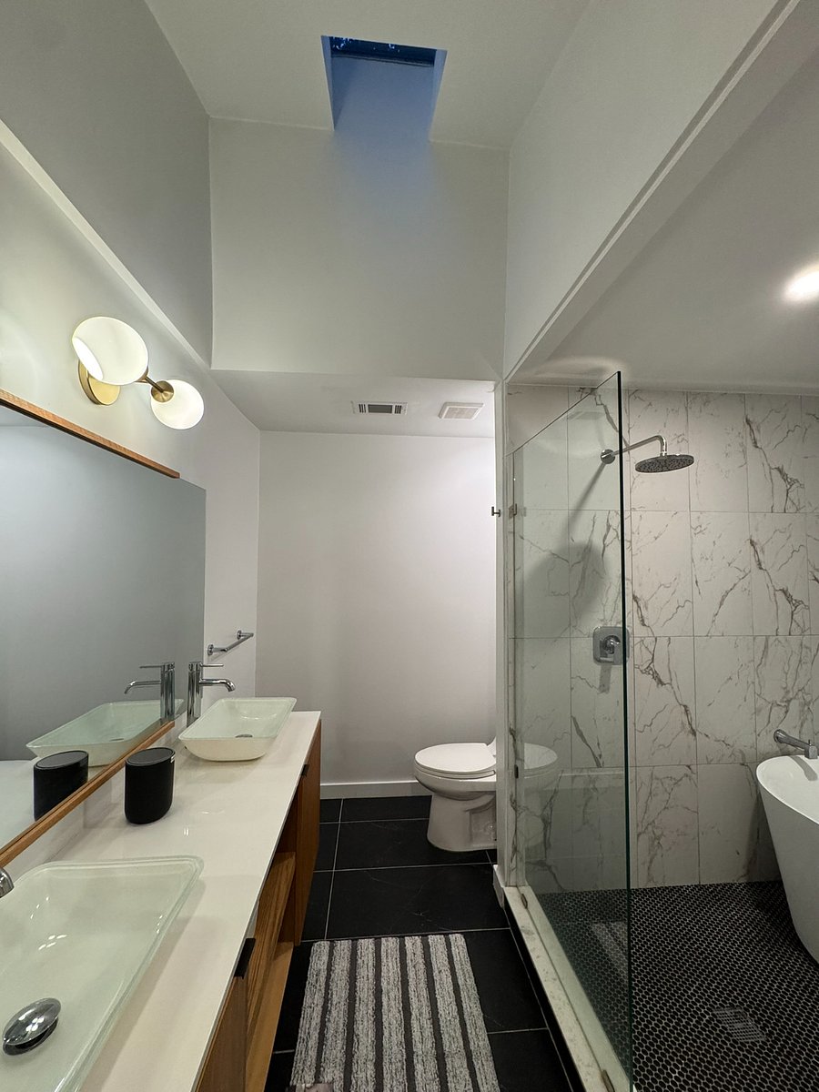 Master bathroom with free stand shower
