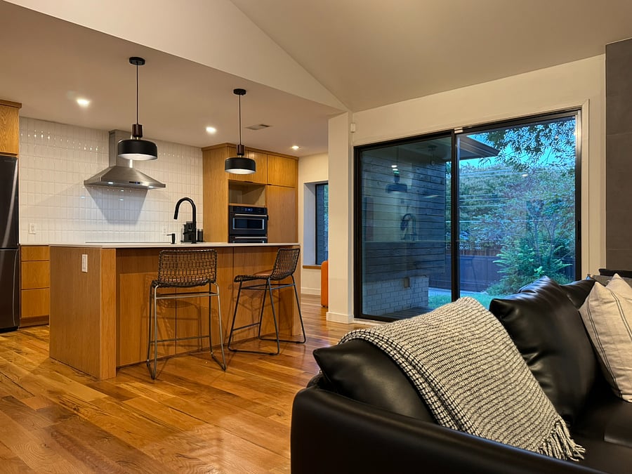 kitchen island looking out to the back yard, full sliding door
