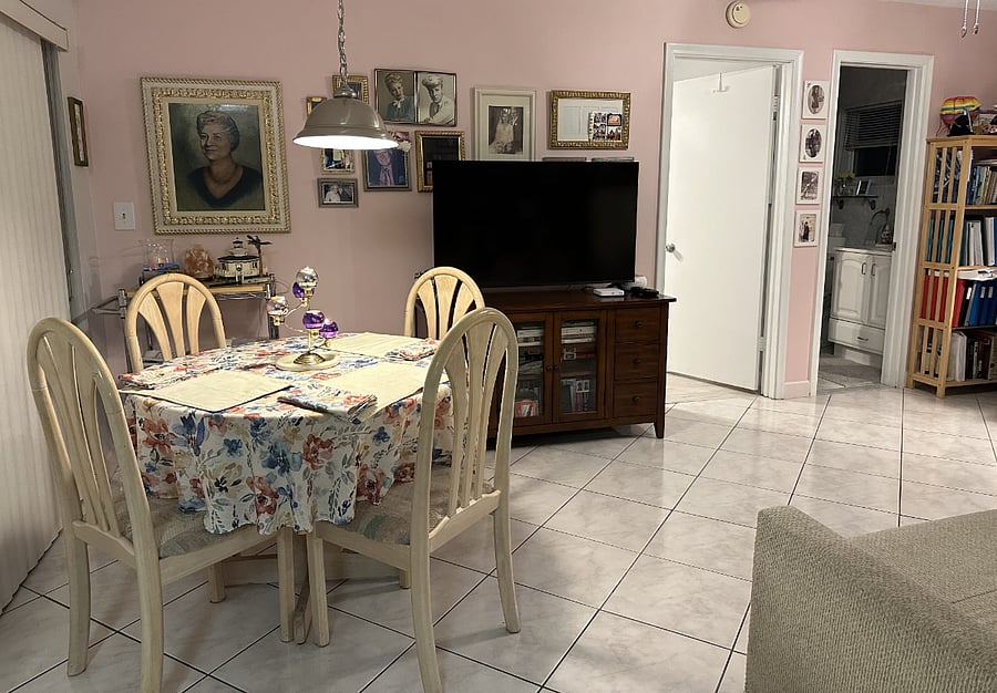 Bedroom/bath sit off the family room and kitchen eating area