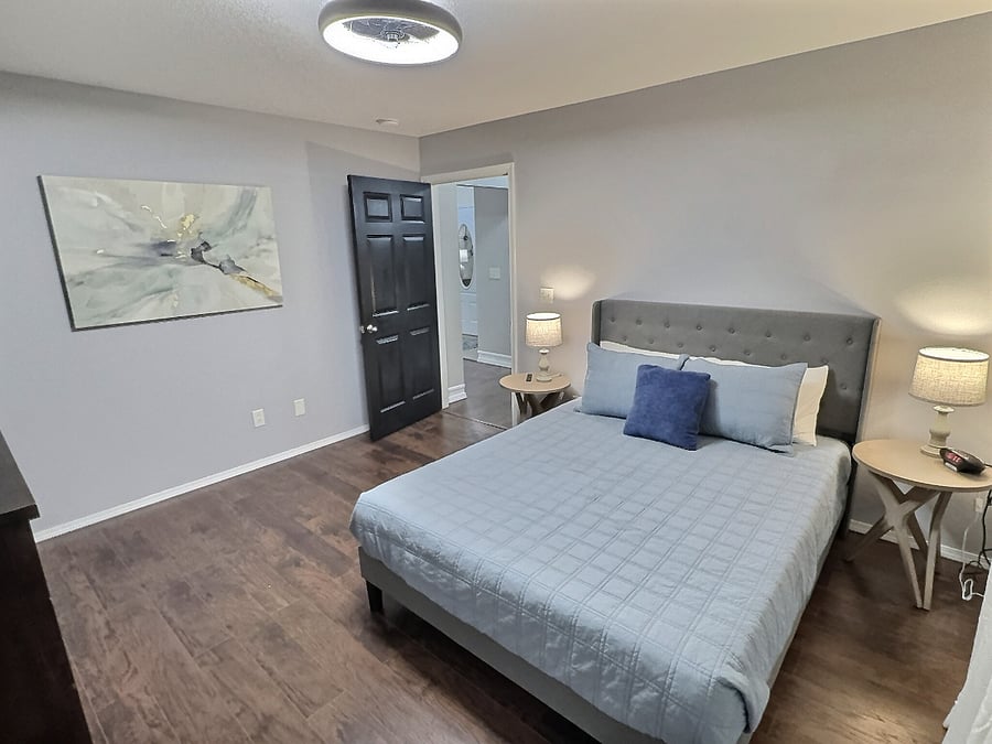 Bedroom 2 with queen bed and 50" Smart TV