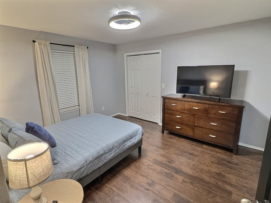 Bedroom 2 with queen bed and 50" Smart TV