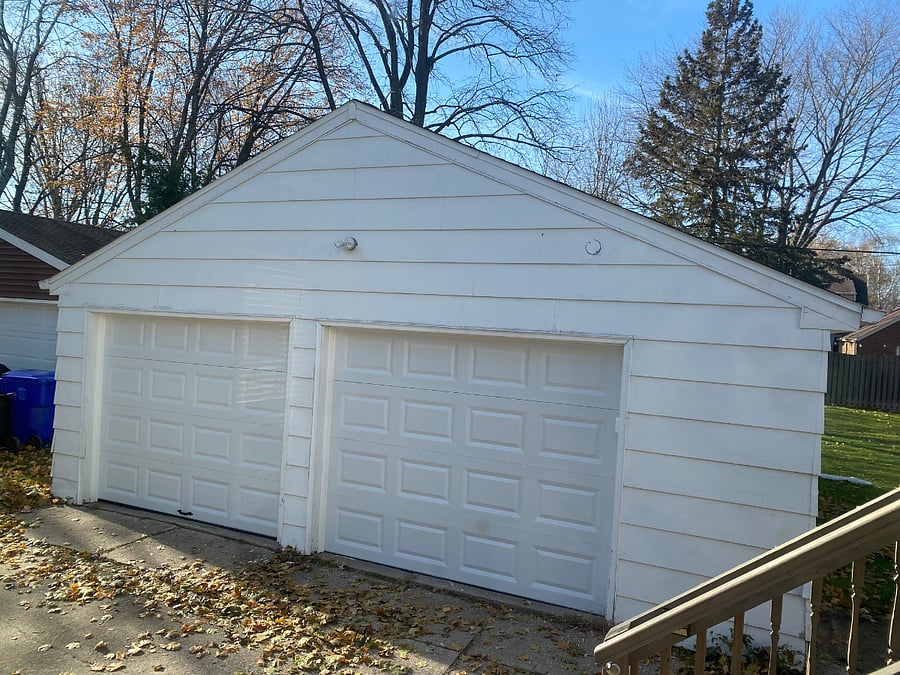 Left side garage unit is reserved for upper tenant. Door and springs are new for safe and easy manual opening/closing.