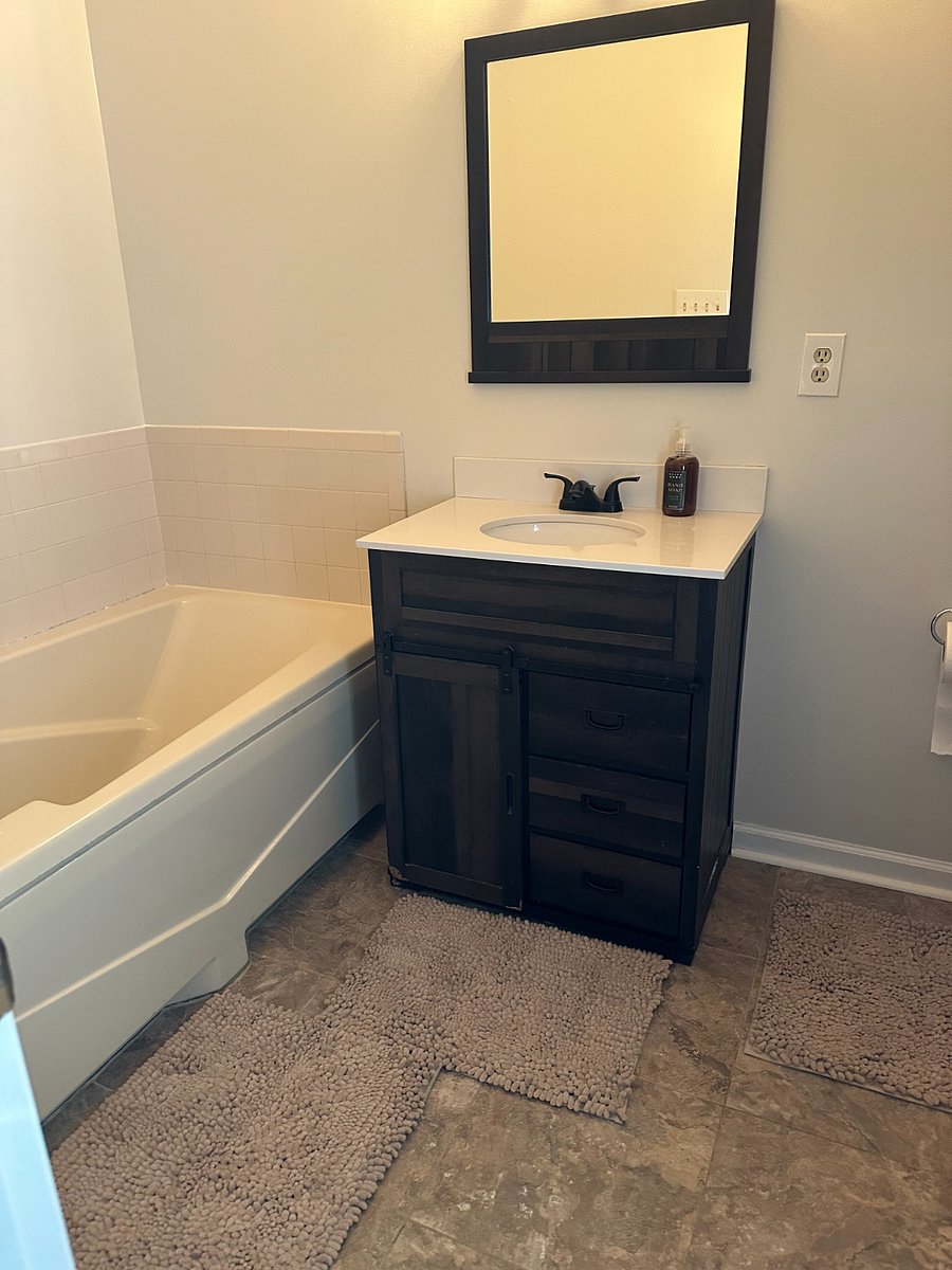MBR has private bathroom and a shower unit, also a bathtub for those wanting relaxation.