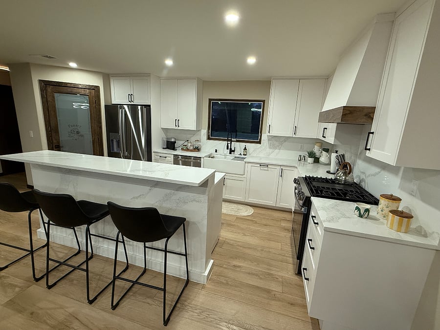 Full kitchen, new appliances, large pantry, island with bar seating.