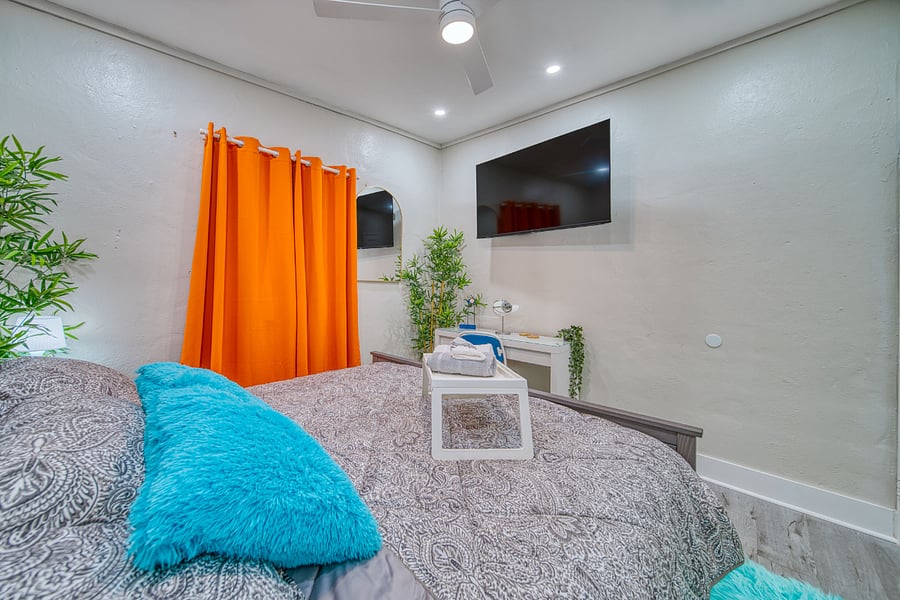 Smart TV, Ceiling Fan, Dark Shades - Room 2