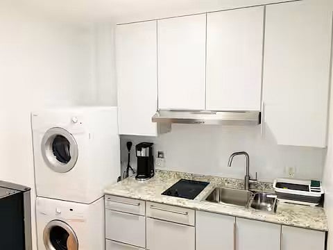 W/D, Full-size Apt Refrigerator, Microwave, Double sink w/garbage disposal, fully stocked kitchen and cookware and cleaning supplies