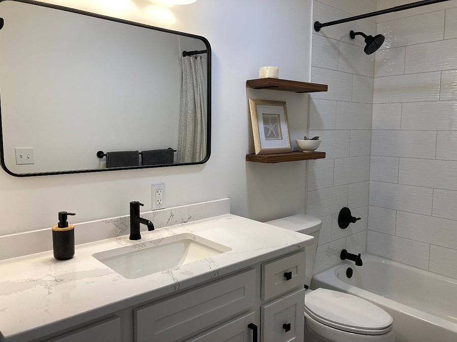 Full bathroom with shower and tub in second bedroom 