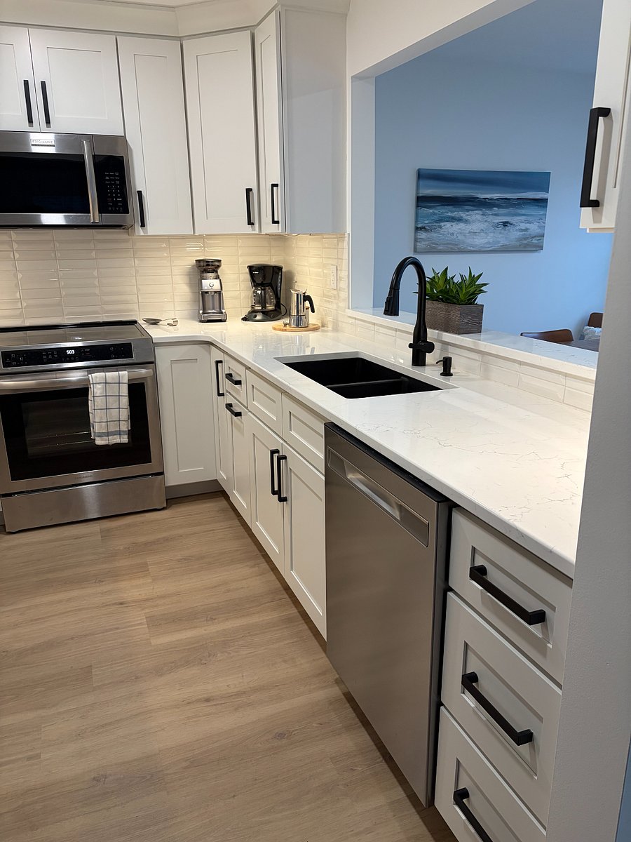 Plenty of counterspace in the kitchen that is equipped with a dishwasher
