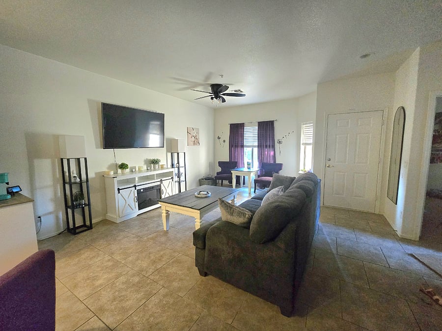 Living Room with electric fireplace.