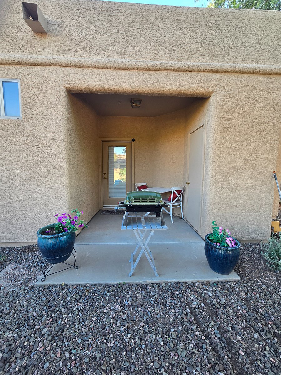 Outdoor seating with grill off the dining area.
