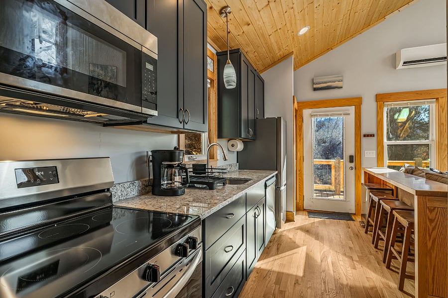 Galley kitchen viewed from bathroom