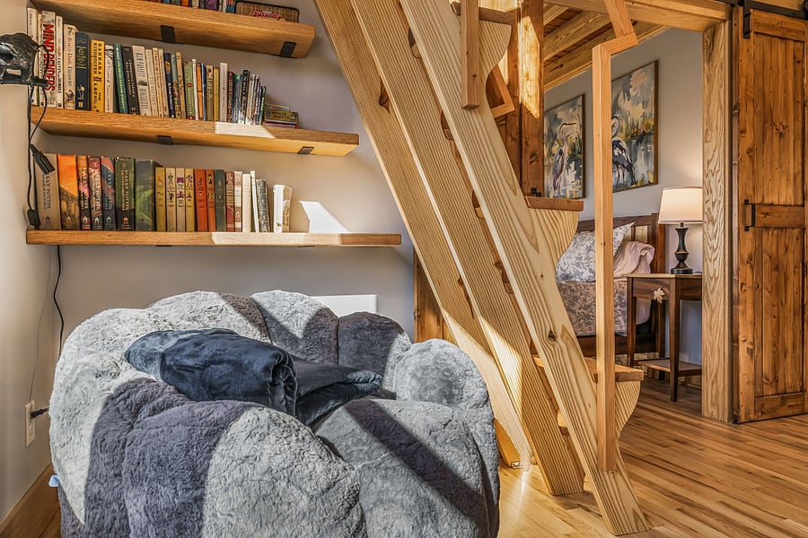 Sunny reading nook under the ship's ladder