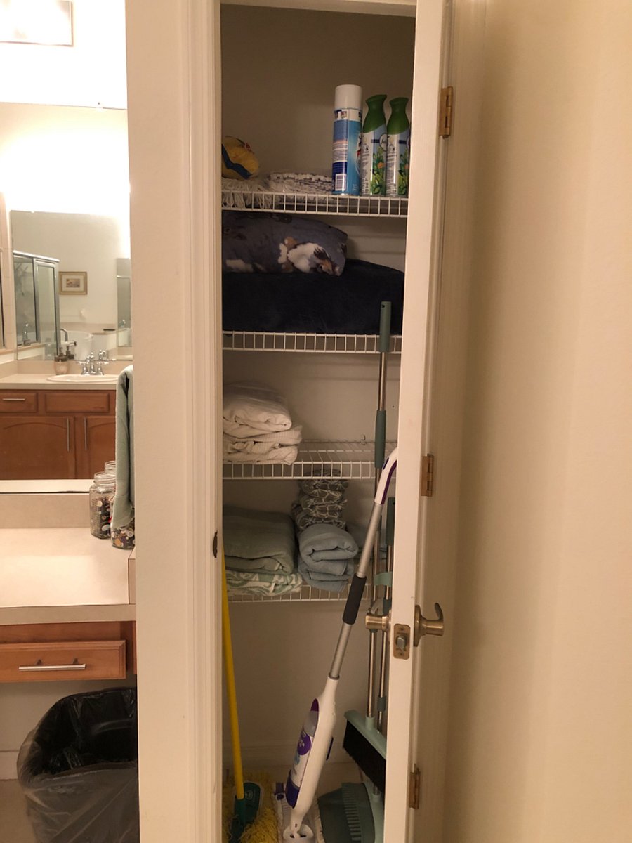 Linen closet in bathroom