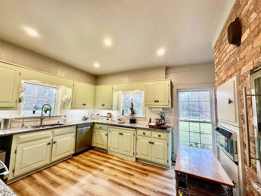 Kitchen with two full size refrigerators 
