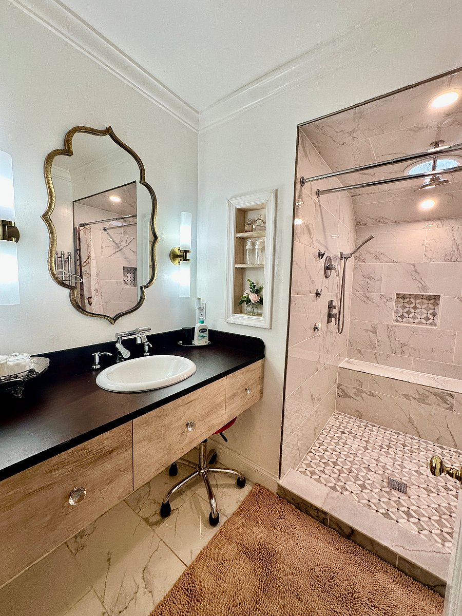 private bath with large shower, rain shower, handheld and body jet