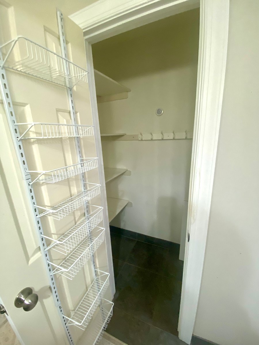 Storage closet/pantry with fridge