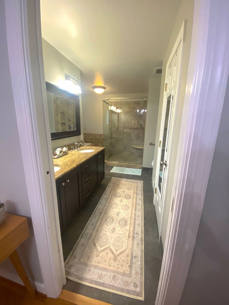 Master bathroom with walk in shower and tub

