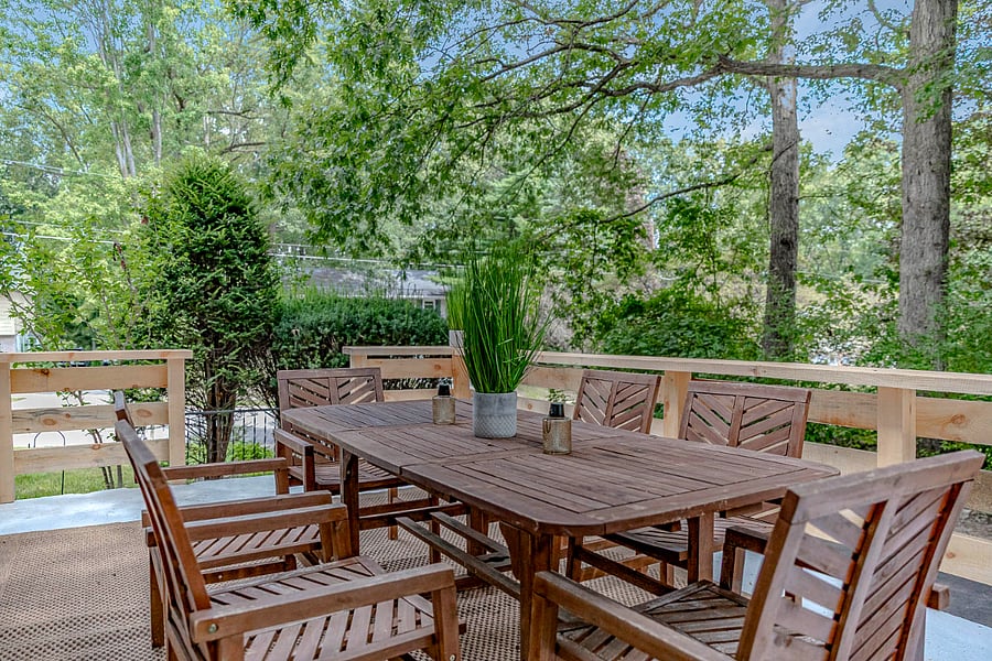 Outdoor Deck
A peaceful, forest-view deck with a wooden dining setperfect for enjoying meals, morning coffee, or relaxing outdoors in a private, natural setting.