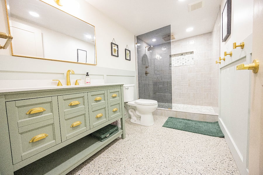 Basement bathroom, not near a bedroom, but can be used as a personal bathroom for a guest.