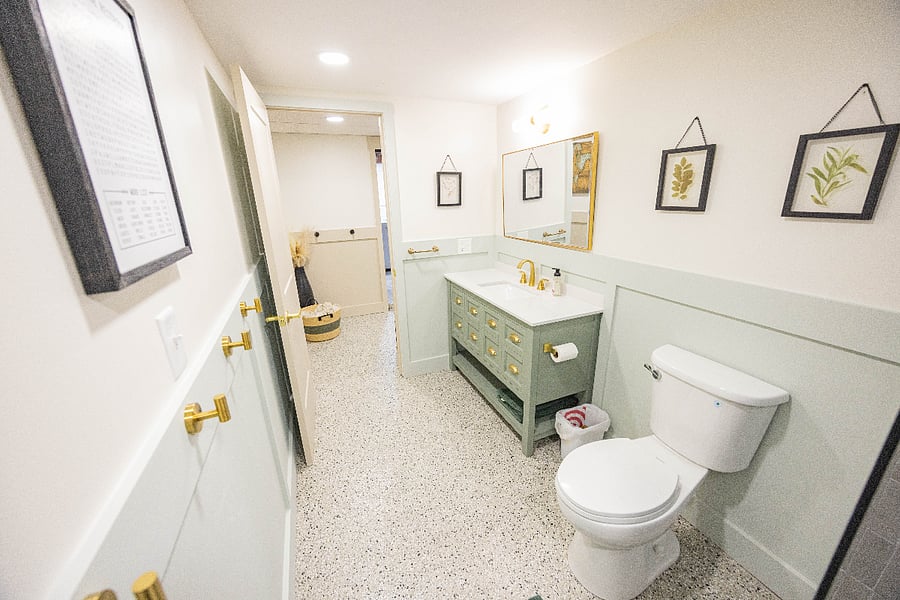 Basement bathroom, not near a bedroom, but can be used as a personal bathroom for a guest.