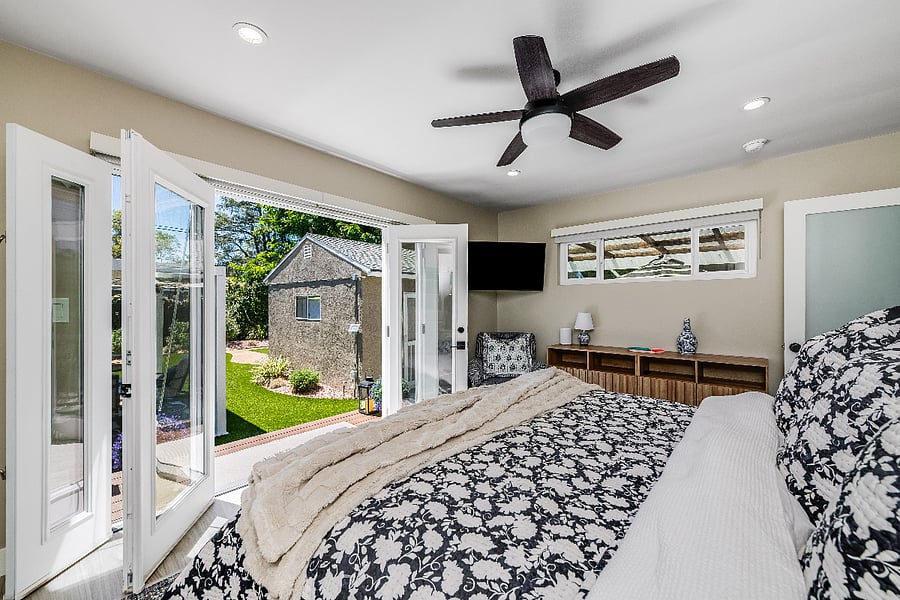 Large King Bedded Room with French Doors to the private back yard.