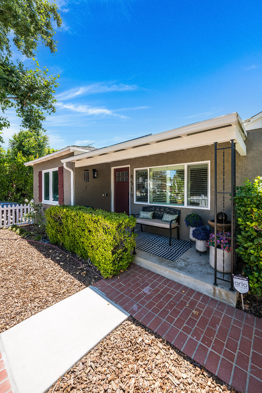 Our peaceful porch. You will see a variety of neighbors walking their dogs, phones, coffee and sometimes walking their wine!