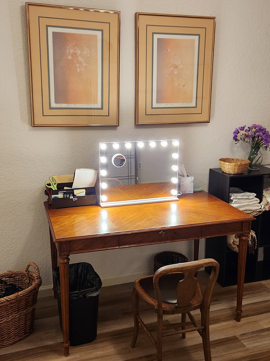  Lighted vanity mirror in dressing area.
