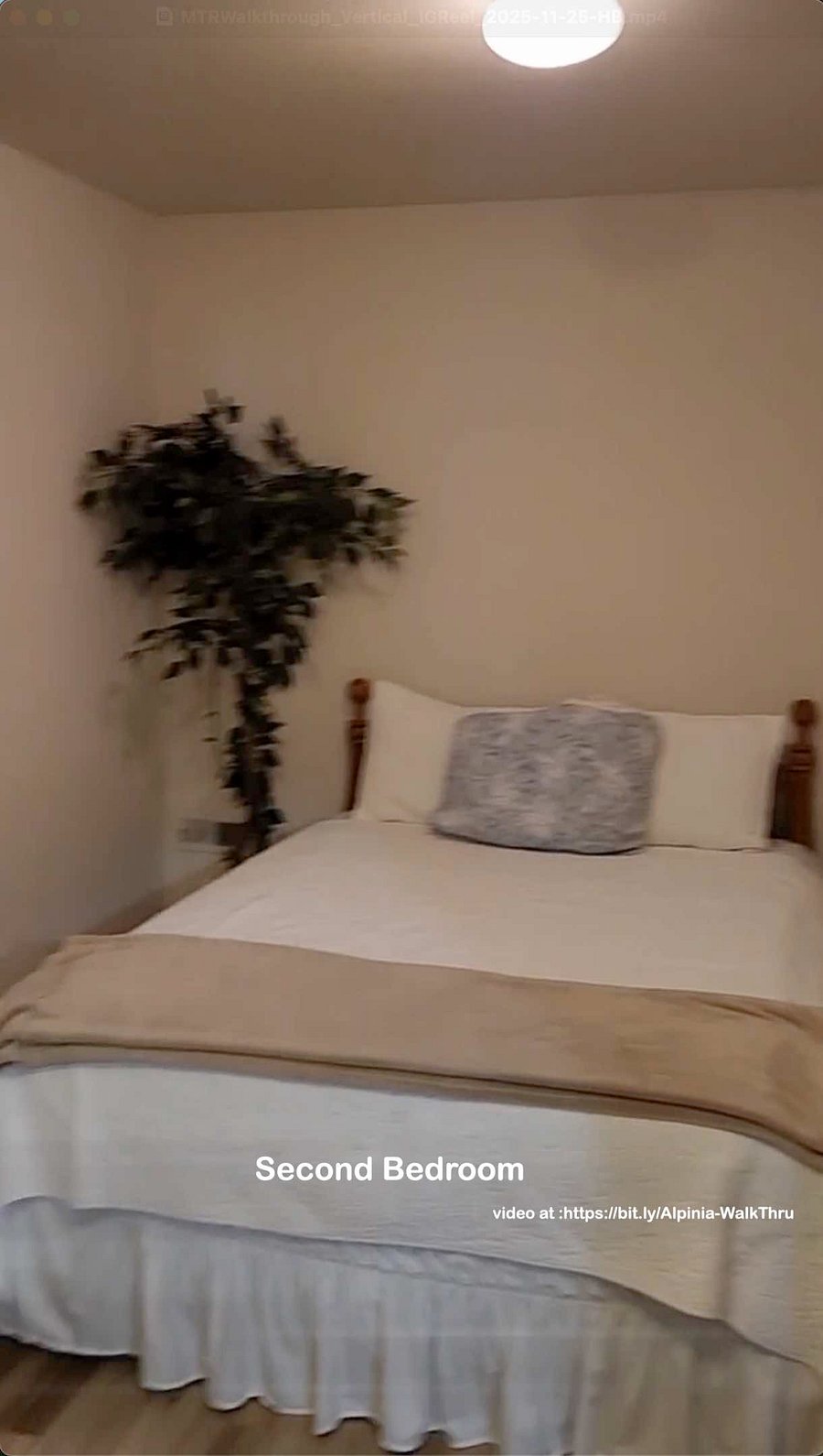 Queen bed in the second bedroom.