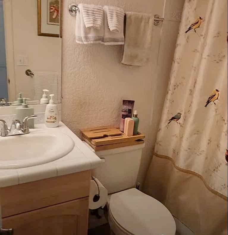 Full bath with tub and shower.