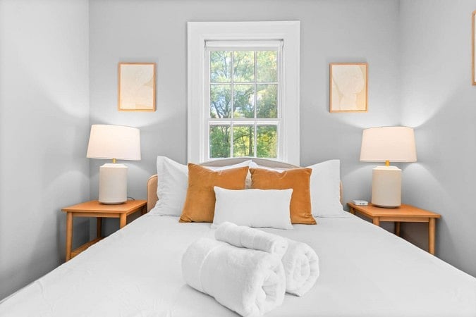 Bed with twin bed side lamps