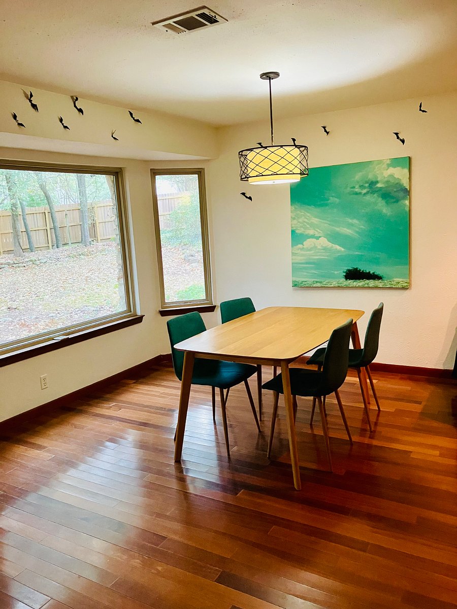 Dining area changes. Sometimes it looks like this & sometimes has dining table & comfy couch that faces the window for bird & squirrel watching.