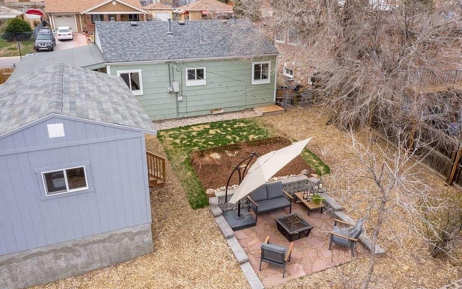 Backyard before the hot tub or sliding glass door was installed. 100% fenced in for dogs.