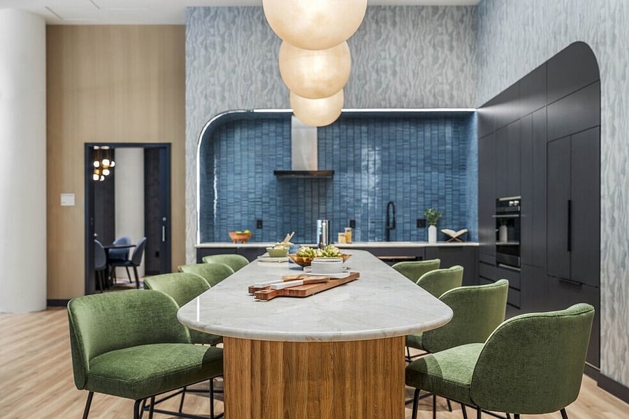 A modern communal dining room complemented by a polished bar area.
Perfect for relaxing with good company and great conversation.